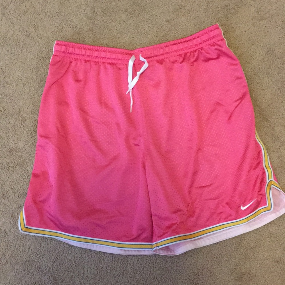 Pink Nike basketball shorts